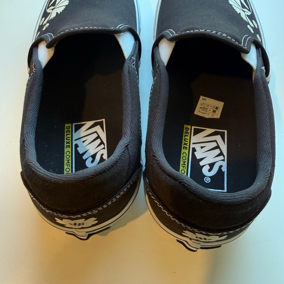 Vans Black Slip-Ons with White Floral Pattern